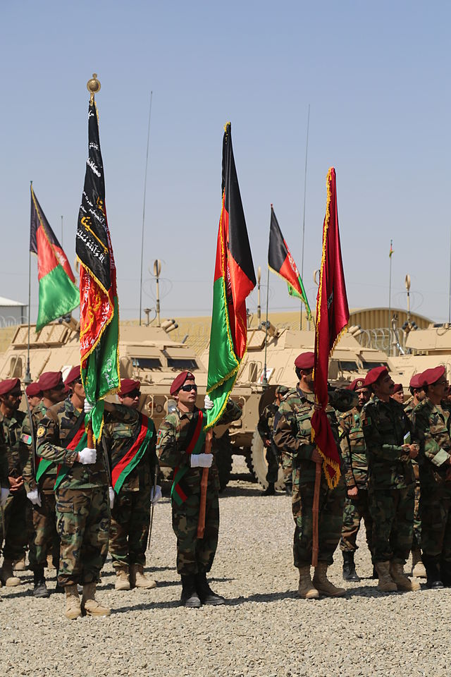 Arghan soldiers with national flag