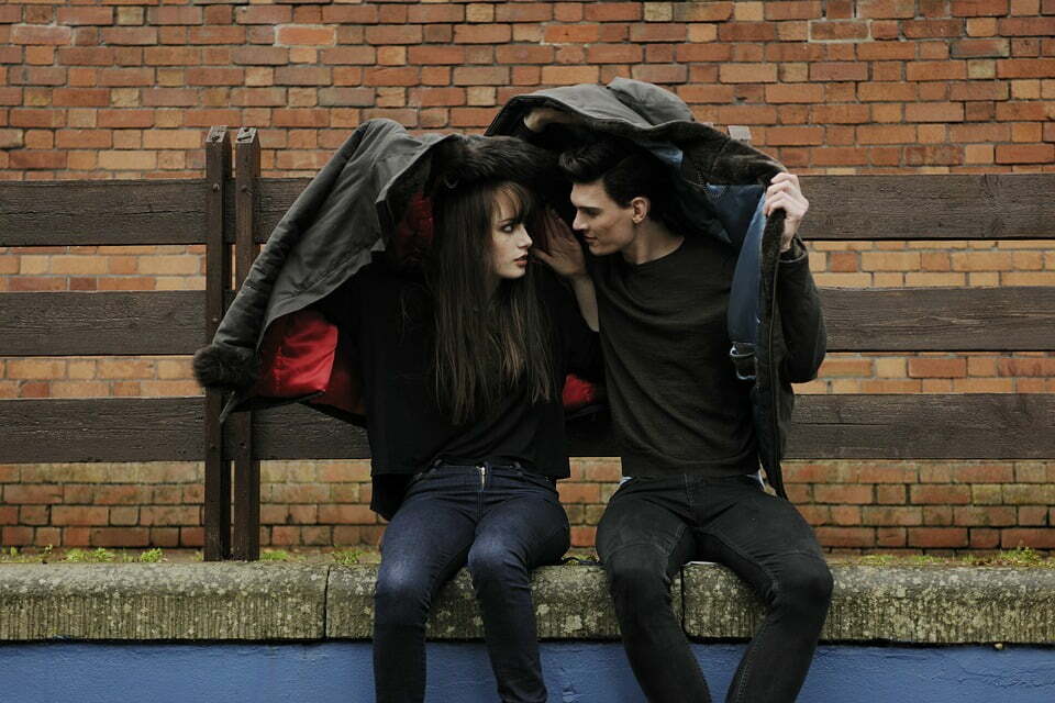 boy and girl in rain