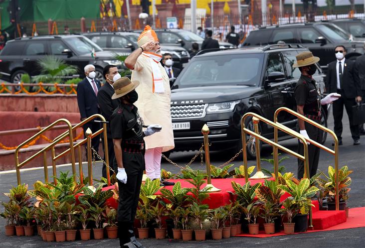PM Modi taking salute