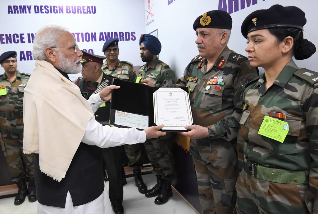 PM presenting citation to officers